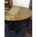 A mahogany drop leaf table.