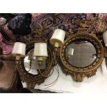 A pair of gilt convex mirrors.