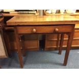 A mahogany tilt top table.