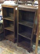 A pair of small oak bookcases.