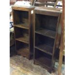 A pair of small oak bookcases.