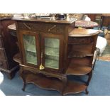 An Edwardian mahogany side cabinet.