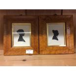 A pair of maple framed silhouettes.