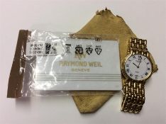 A Raymond Weil gold plated wristwatch together wit