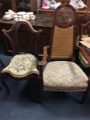 A mahogany decorative chair with inset tapestry se