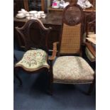 A mahogany decorative chair with inset tapestry se