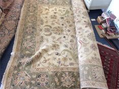 A large tapestry carpet. Est. £100 - £150.