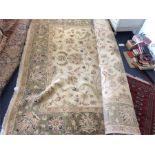 A large tapestry carpet. Est. £100 - £150.