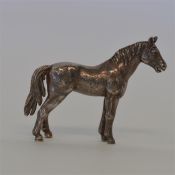 A modern ornament in the form of a racehorse in st