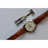 A gent's large stainless steel wristwatch on leath
