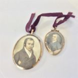 An oval gold framed miniature of a gent with hair