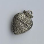 A Continental silver heart shaped vesta with hinge
