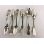 A heavy set of six Russian teaspoons decorated wit