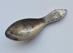 An 18th Century Dutch caddy spoon with bright cut