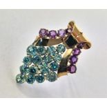 A gold amethyst and zircon brooch of modernistic d