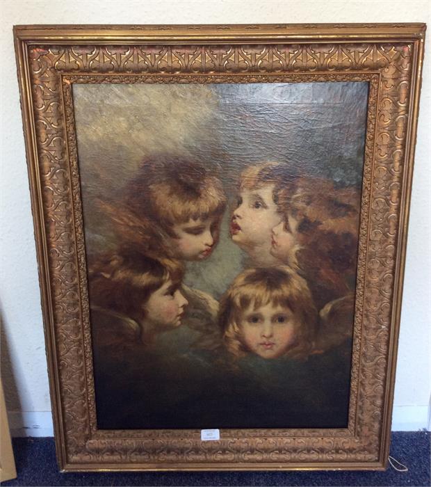 A gilt framed oil on canvas depicting winged infan