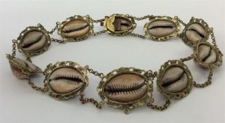 An unusual Antique pinch back necklace mounted wit