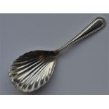 A fluted caddy spoon. London 1971. By Vanders. App