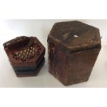 A concertina in fitted wooden box. By Lachenal & C