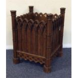 An oak carved jardiniere stand with wavy edge. Est