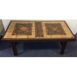 A stylish tiled top Danish occasional table togeth
