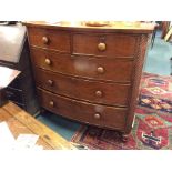 A mahogany bow front chest of five drawers. Est. £