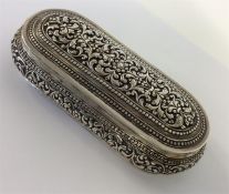 An oval dome top box with scroll decoration of Per