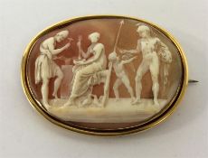 A good oval gold framed shell cameo depicting Vulc