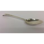 A good bright cut spoon decorated with swags and b