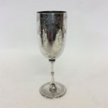 An attractively engraved goblet. Approx. 20 cms hi