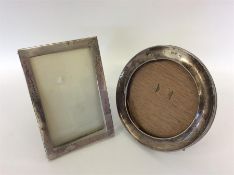 A small rectangular picture frame with plain margi