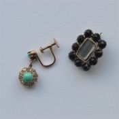 A turquoise and diamond earring together with a mo