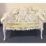 A good pair of cast benches with floral decoration