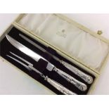 A three piece Kings pattern carving set in box. Es