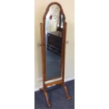 A mahogany Edwardian dressing mirror on bracket fe