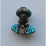 An early Blackamoor bust, the body decorated with