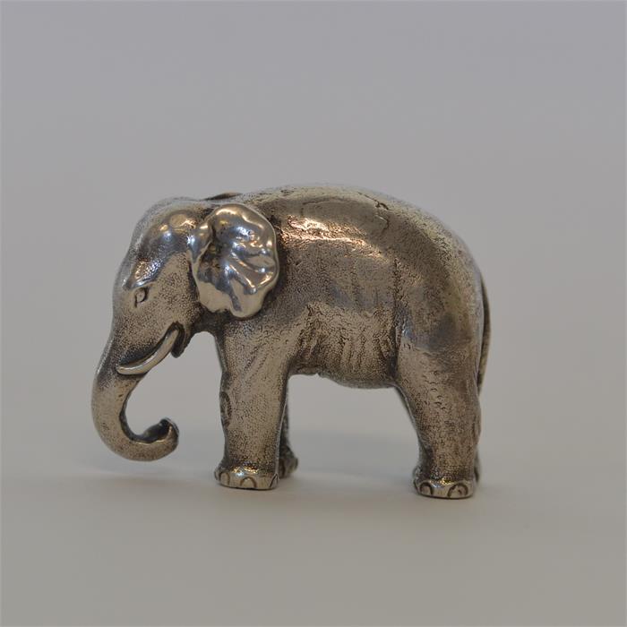 A Russian figure of an elephant in standing positi