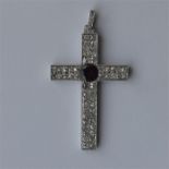 A large platinum and diamond cross with loop top a