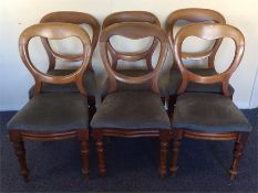 A set of six balloon back chairs on turned support