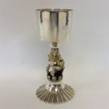 A good quality silver gilt and silver cup mounted