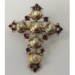 An 18th Century garnet and pearl cross with loop t
