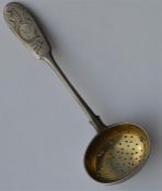 A Russian fiddle pattern sifter spoon with gilded