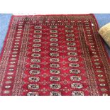 An Oriental tapestry rug. Est. £50 - £80.