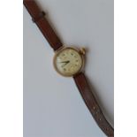 A gent's circular Gewa wristwatch on leather strap