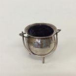 An unusual pin cushion in the form of a cauldron w