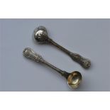 A pair of Kings pattern salt spoons with gilt bowl