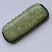 An unusual shagreen hinged spectacle case with sil
