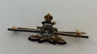 A 15 carat enamel decorated Military brooch with d