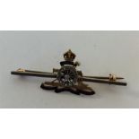 A 15 carat enamel decorated Military brooch with d