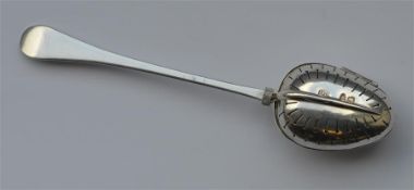 An unusual Antique tea infuser, the stem with thre